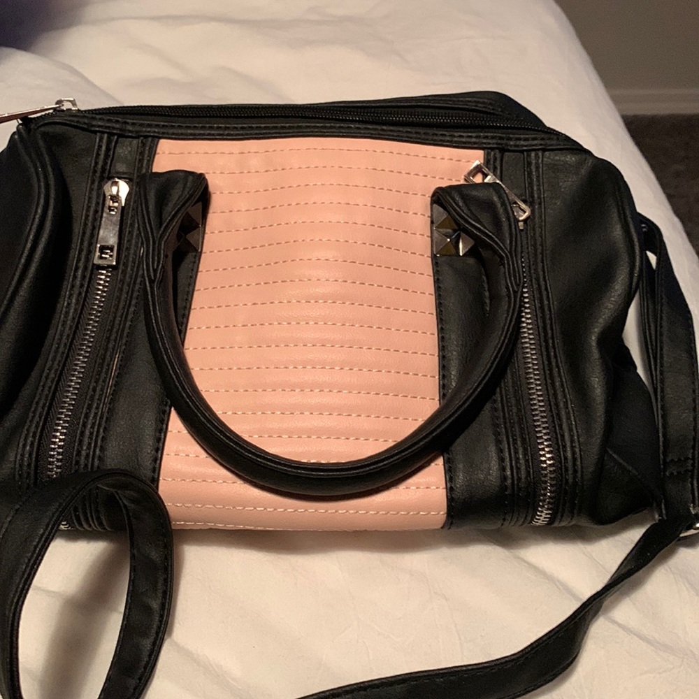 Icing pink and black purse